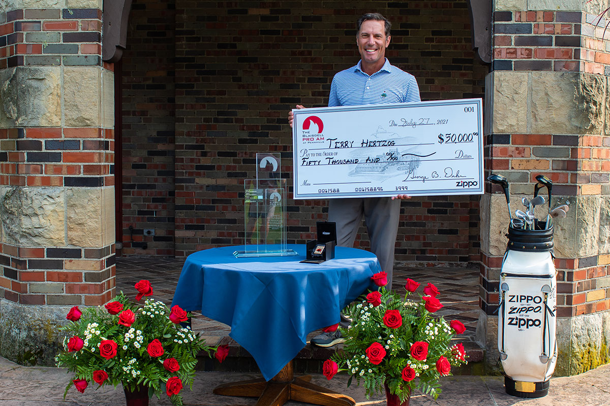 2021 Blaisdell Pro Am winner Terry Hertzog with over-sized winning check.