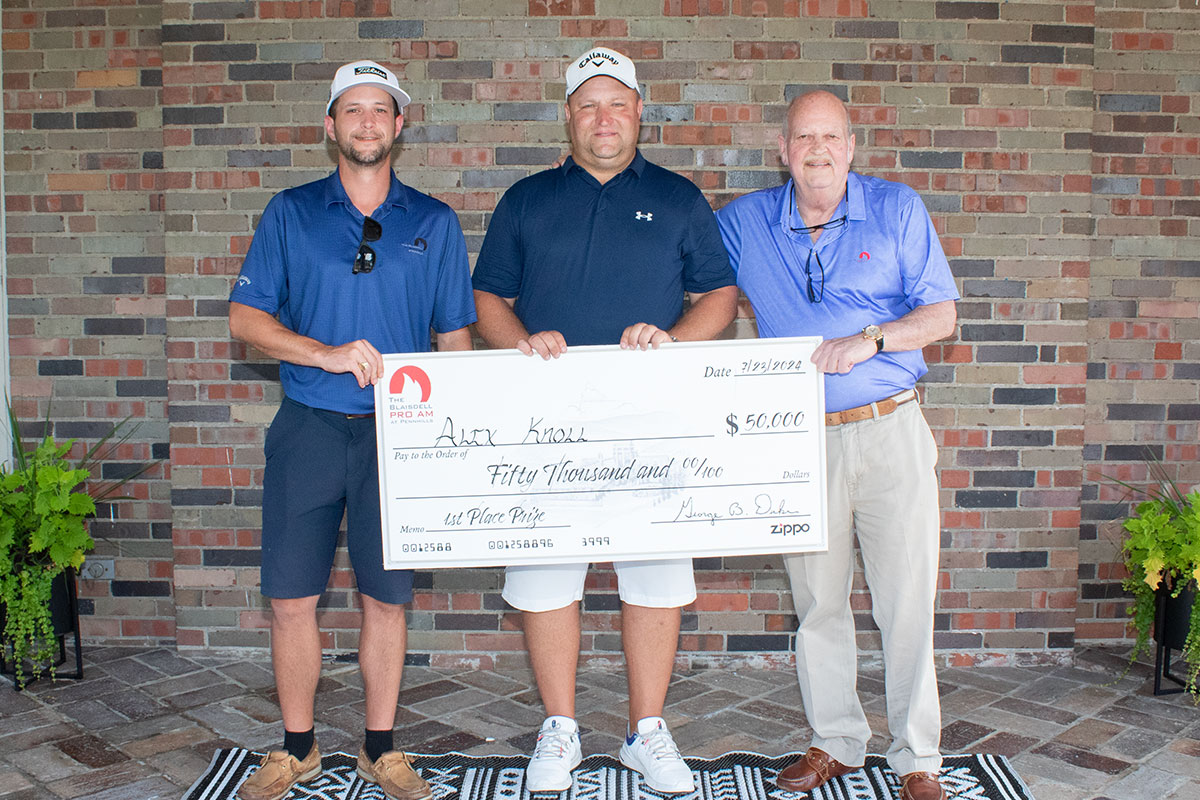 2024 Blaisdell Pro Am winner Alex Knoll with over-sized winning check.